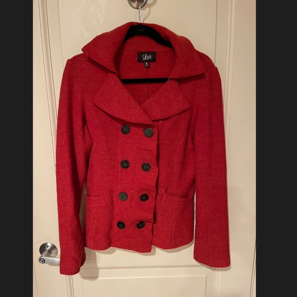 Deep orange jacket.  Medium.